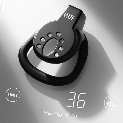 Käfig auf einer Waage mit 36 g Anzeige