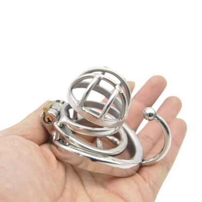 Käfig mit Hodentrenner in einer Hand