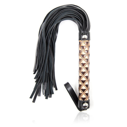 Flogger mit gelbem gemusterten Griff