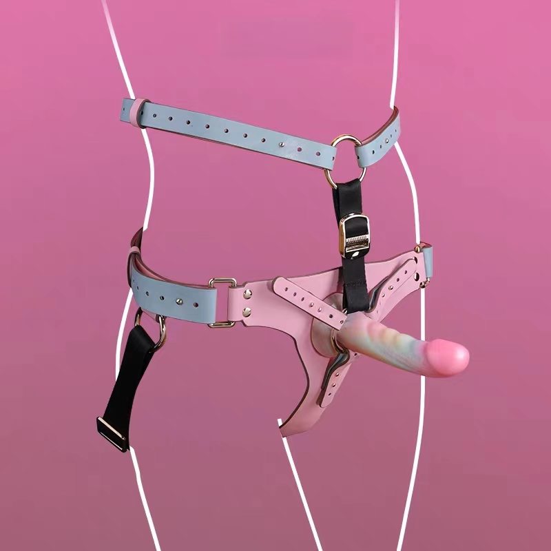 Pastellfarbener Gürtel mit Dildo