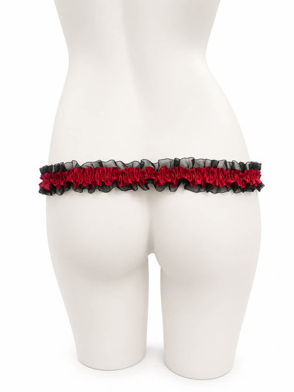 Schwarz-roter Spitzengurt von hinten