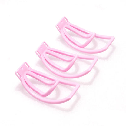 Vergleichsbild mehrerer pinker Clipformen